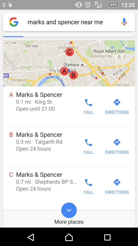 Ảnh chụp màn hình điện thoại di động của một tìm kiếm trên google cho "Marks và Spencer gần tôi"hiển thị bộ ba kết quả địa phương dưới một bản đồ nhỏ của khu vực.